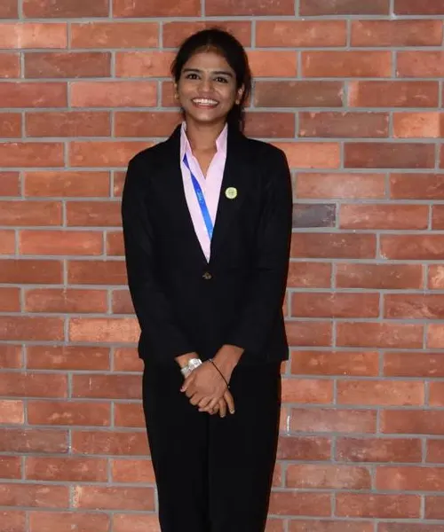 Experienced faculty member guiding students in classroom