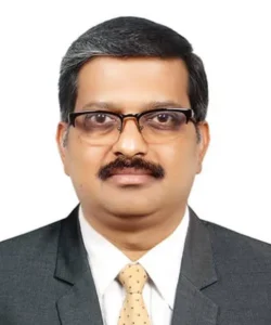 Experienced faculty member guiding students in classroom
