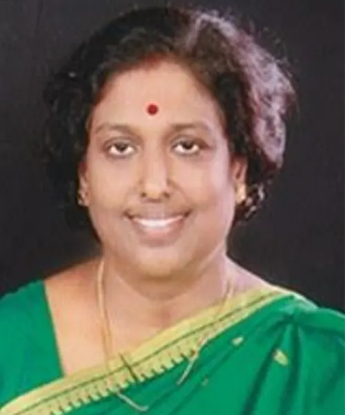 Experienced faculty member guiding students in classroom